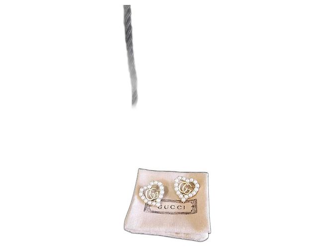 Orecchini Gucci GG oro metallo Gold hardware