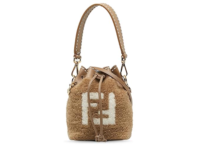 Borsa a secchiello Mini Mon Tresor in shearling marrone Fendi Pelle Pelliccia Vitello simile a un vitello  ref.1172175