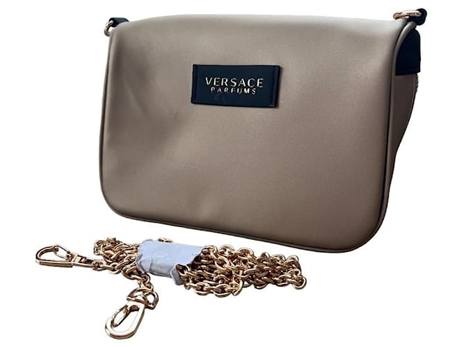 Versace Clutch bags Golden Polyester  ref.1178303