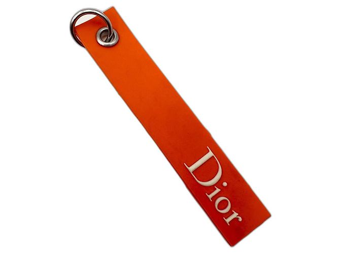 DIOR accessorio  in gomma "Remove Before Flight"