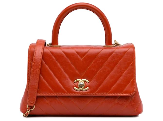 Coco Handle Petit sac à main Chanel en cuir d'agneau rouge à chevrons et poignée Coco  ref.1180054