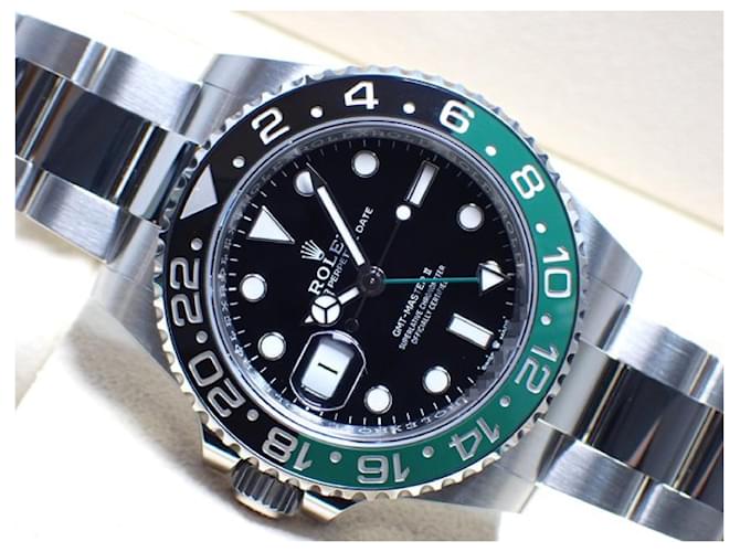 ROLEX GMT MasterII canhoto verde/ Pulseira Oyster com moldura pretaRef.126720VTNR masculino não usado Prata Aço  ref.1183284