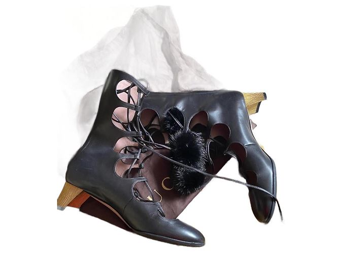 Gucci Black Leather Lace Up Boots with Mink Pompon