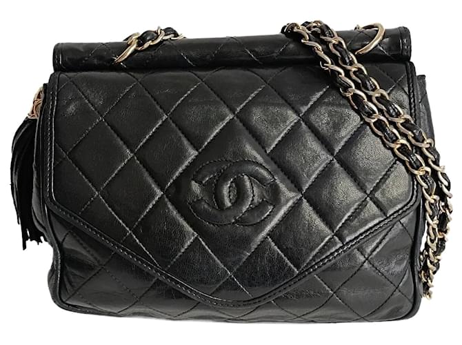 Chanel Chanel camera shoulder bag with fringe in black matelassé leather  ref.1194398
