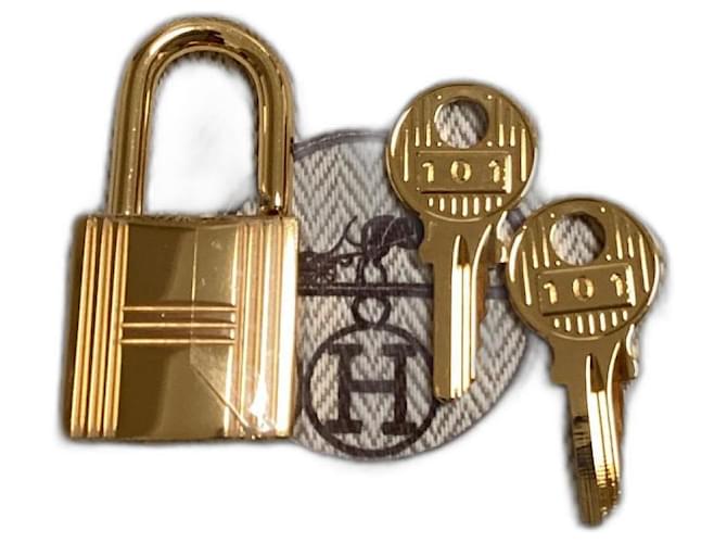 Kelly Hermès Ciondolo da borsa con lucchetto dorato Gold hardware Metallo  ref.1204907