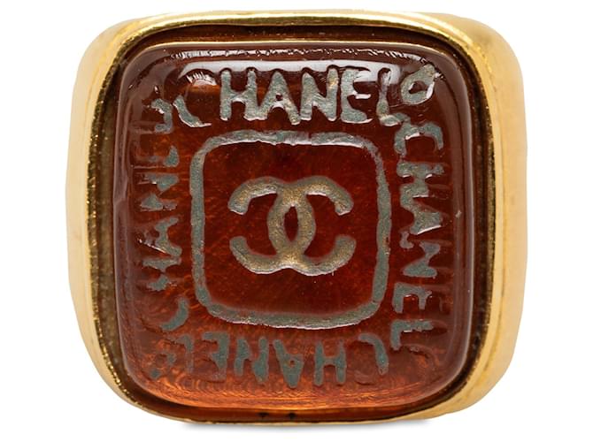 Anillo con logo en tono dorado de Chanel Gold Metal Chapado en oro  ref.1205583