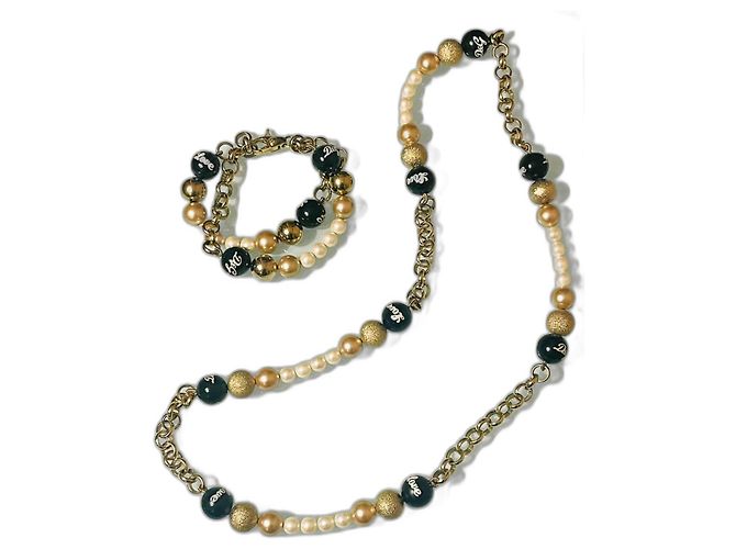 Conjunto DOLCE & GABBANA de colar e pulseira em aço banhado a ouro com pérolas em ouro preto e branco Dourado