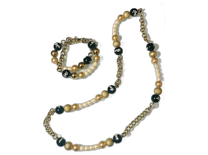 Ensemble DOLCE & GABBANA collier et bracelet en acier plaqué or avec perles en or noir et blanc Doré  ref.1206298