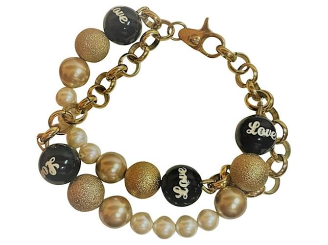 DOLCE & GABBANA gefüttertes Armband mit Goldkette, Weiße Perlen, Gold und Schwarz Golden Stahl  ref.1206823