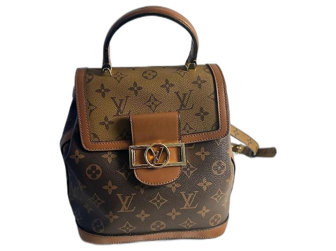 Sobe Louis Vuitton delfino Marrone