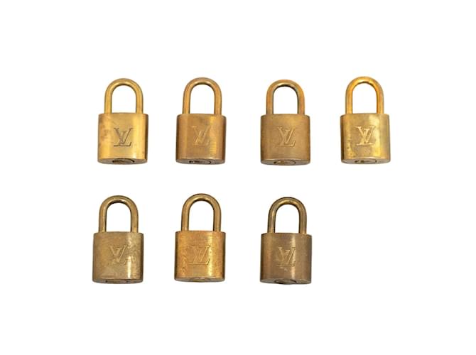 Louis Vuitton Brass Padlock & Key Set Golden Metal  ref.1207247