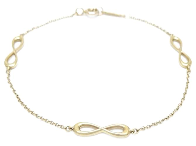 Tiffany & Co Infinity Golden Yellow gold  ref.1207595