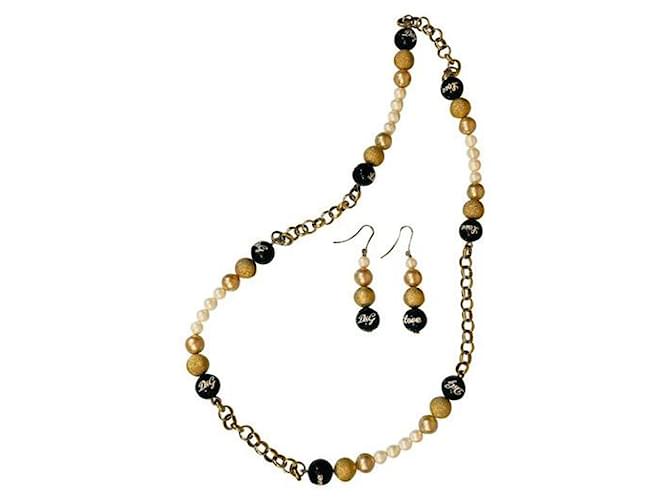 DOLCE & GABBANA Set aus Halskette und Ohrringen aus goldenem Stahl mit weißen Perlen, Gold und Schwarz  ref.1208654