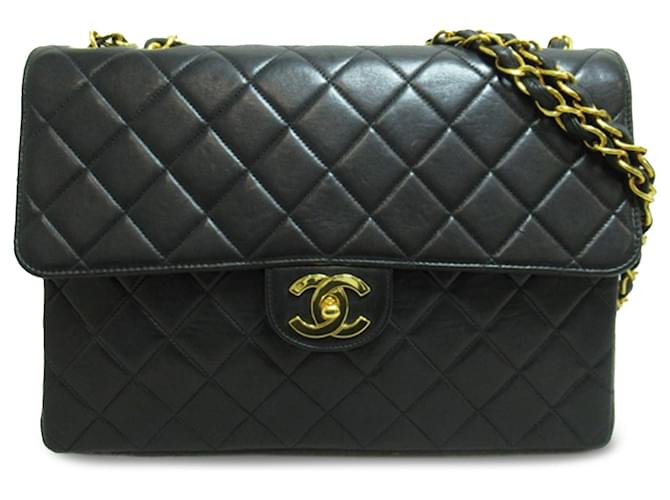 Bolsa Chanel Black Jumbo Classic de pele de cordeiro com aba simples Preto Couro  ref.1208769