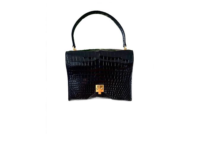 Raro modello G8 Hermès in coccodrillo nero