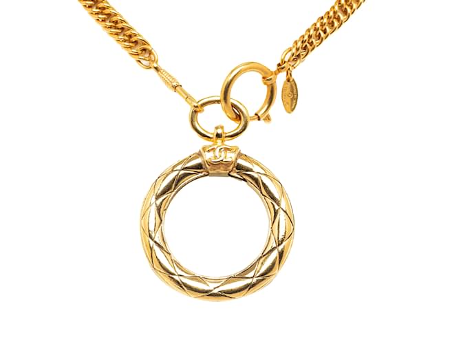 Collana con pendente con lente d'ingrandimento a catena placcata oro Chanel in oro D'oro Vetro  ref.1212740