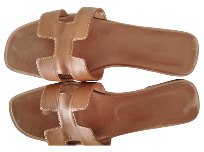 Hermès Oran sandals in gold smooth calf leather Brown  ref.1217661