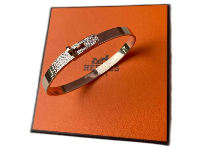 Bracciale Hermès Kelly in oro rosa e diamanti D'oro 