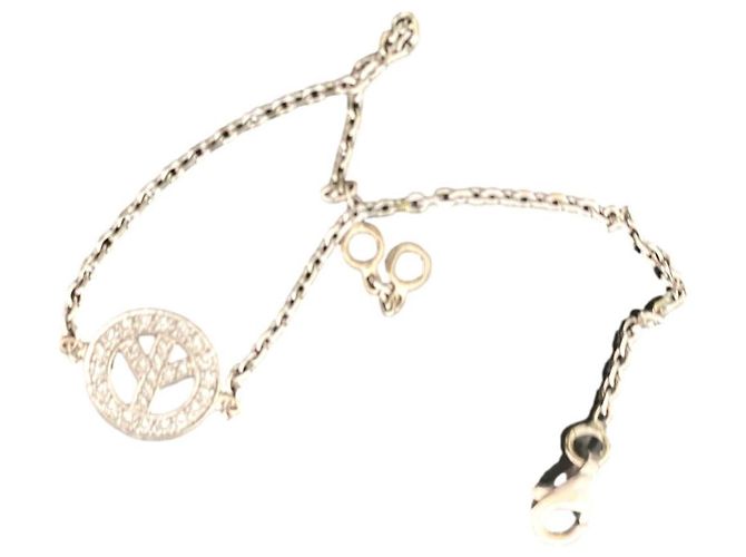 Pulsera Edouard Nahum de oro blanco con brillantes