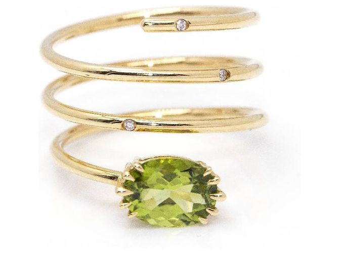 Autre Marque Anello a spirale in oro e peridoto. Verde chiaro