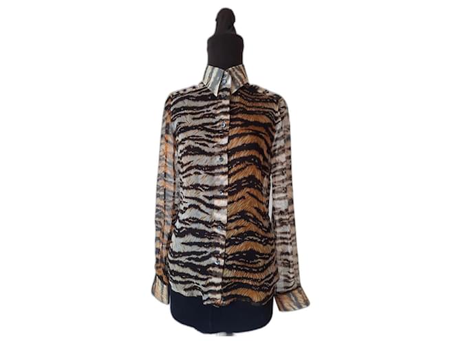 Dolce & Gabbana blusa camisera estampada animalier con parte superior de seda Multicolor  ref.1224624