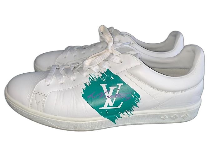 Baskets Louis Vuitton en cuir blanc