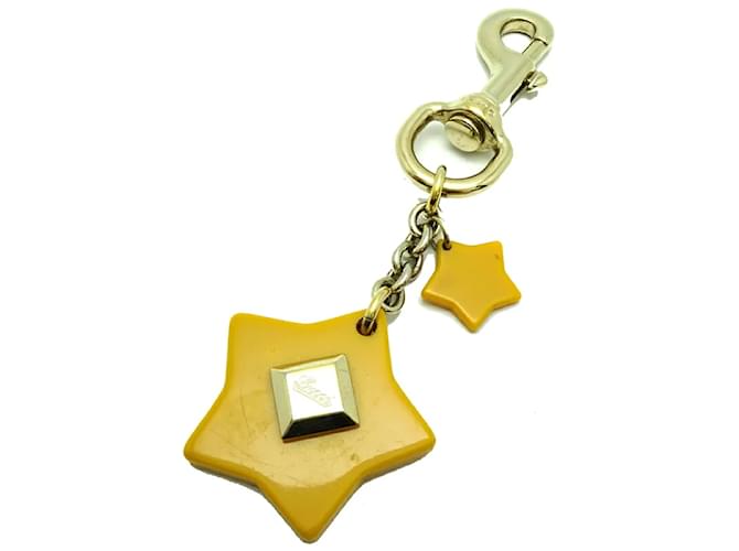 Gucci Porte-clés à breloque étoile Métal Jaune  ref.1227808