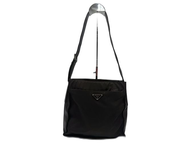 Prada Bolsa Tessuto em nylon e couro Castanho escuro