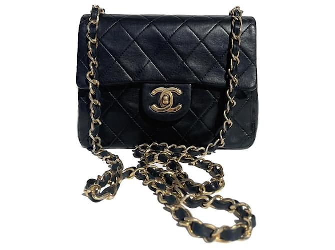 Bolso de mano Chanel Mini Timeless en cuero acolchado negro Piel de cordero  ref.1230276