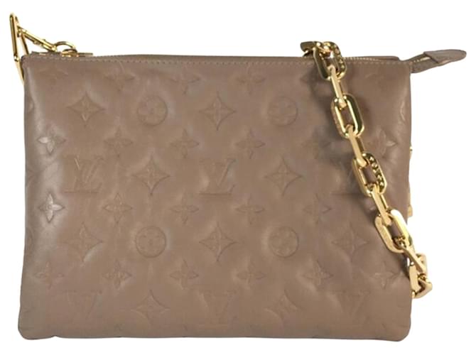 Louis Vuitton Brown Monogram Embossed Puffy Lammfell Coussin PM Braun Taupe Leder  ref.1232826