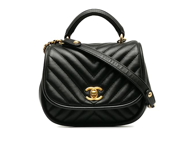 Schwarze Chanel Mini Reverse Quilted Chevron Lammleder-Rundtasche  ref.1238237