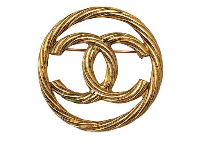 Broche Chanel CC dorée Métal  ref.1238972