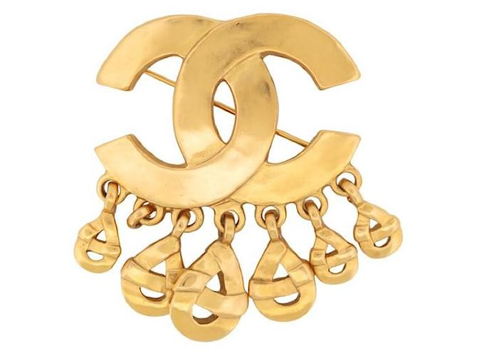 Other jewelry VINTAGE RARE CHANEL LOGO CC BROOCH 1997 BROOCH GOLD METAL TASSEL CHARMS Golden  ref.1239238