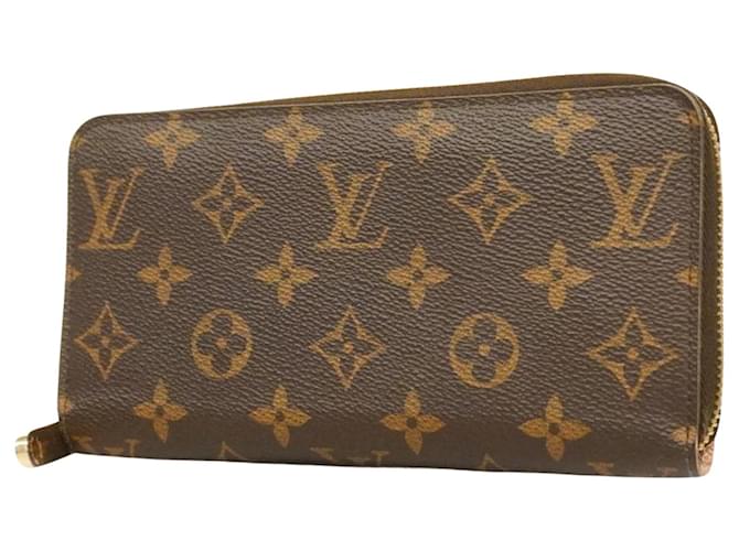 Louis Vuitton Portefeuille zippy Marrom Lona  ref.1240148