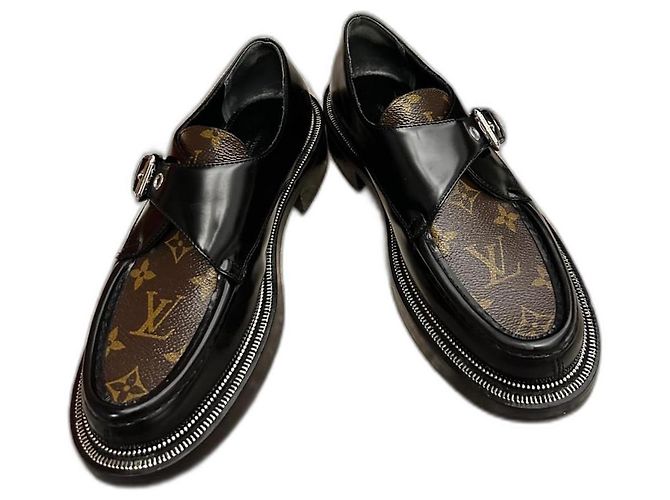 Mules Louis Vuitton em couro