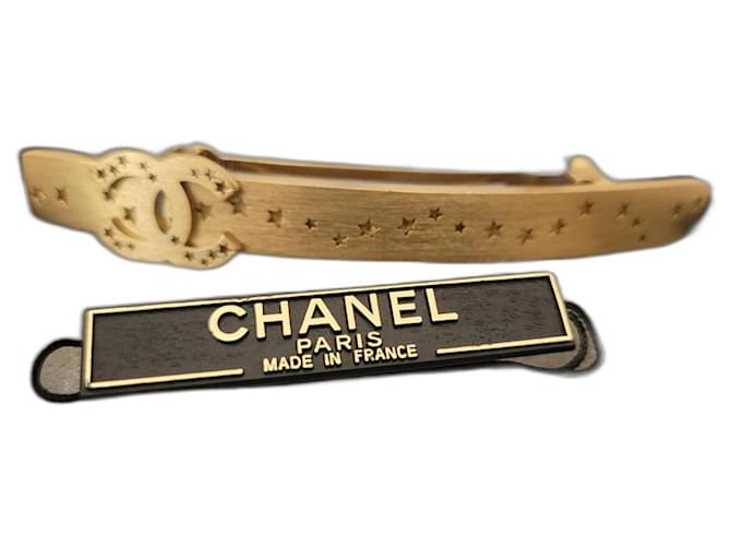 Barrete Chanel estrelas CC Dourado Metal  ref.1246622