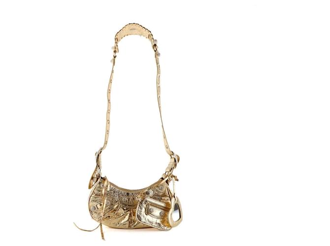 BALENCIAGA Handbags Le Cagole Golden Leather  ref.1248296