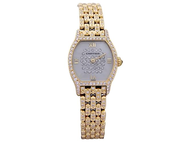 Cartier “Tortoise” yellow gold watch, diamants, Mother of Pearl. Diamond  ref.1252236