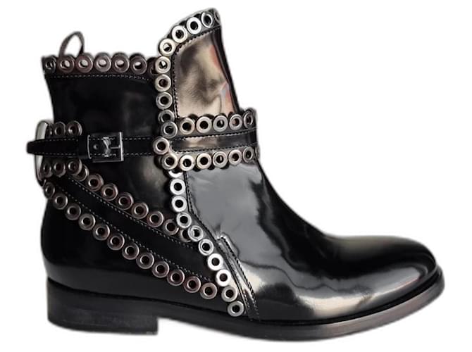 Alaïa Alaia black leather flat boots with metal circles  ref.1252657