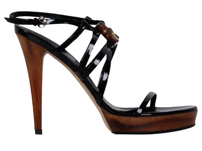 Chaussures Gucci noires avec talons en bois et détails en bois sur le devant  ref.1253233
