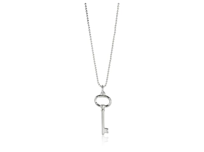 Tiffany & Co TIFFANY Y COMPAÑIA. Mini colgante de llave ovalada con cadena de cuentas en plata de ley Metálico Metal  ref.1253964