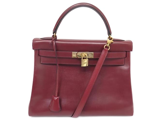 Hermès Kelly Handtasche 32 Zurückgegeben in ziegelroter Box-Handtasche aus Leder zum Umhängen  ref.1256880