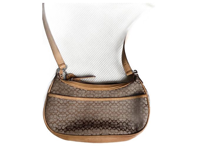 Borsa Coach in pelle e tessuto ricamato con monogrammi Beige