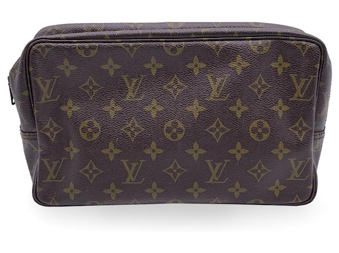 Louis Vuitton Clutch Bag Vintage Trousse de Toilette Brown Cloth  ref.1259295