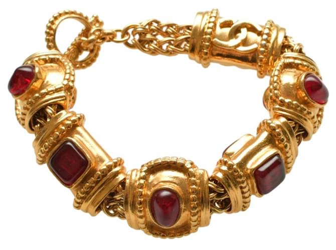Pulsera de cadena vintage CHANEL súper rara chapada en oro con gripoix rojo. Dorado Metal  ref.1266061