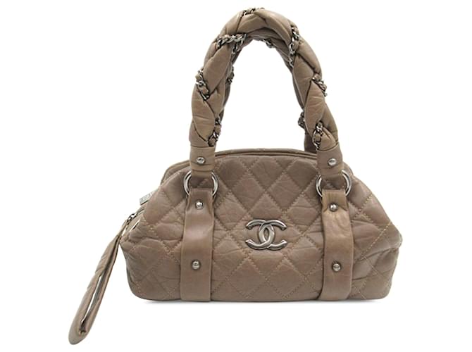 Taupefarbene Chanel Bowler-Handtasche aus geflochtenem Lammleder im Used-Look  ref.1268534