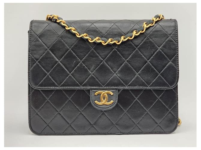 Wallet On Chain Bolso de solapa pequeño clásico atemporal de Chanel Negro Cuero  ref.1269099