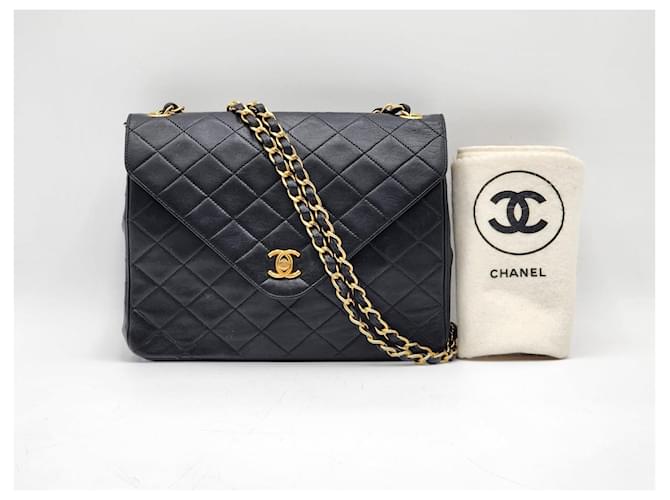 Timeless Chanel zeitlose klassische Umschlagtasche mit Einzelfach und 24 Karat Gold Schwarz Leder  ref.1269992