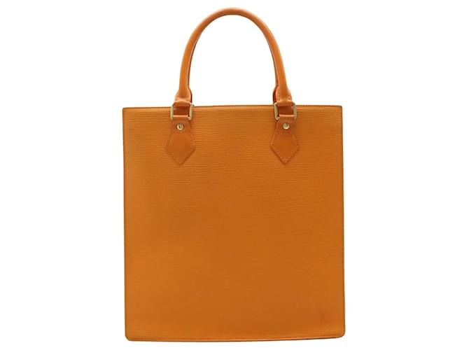 Louis Vuitton Sac plat Cuir Orange  ref.1274353