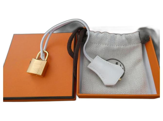 sininho, puxador e cadeado Hermès novos para bolsa Hermès, caixa e saco de pó. Branco Couro  ref.1281893